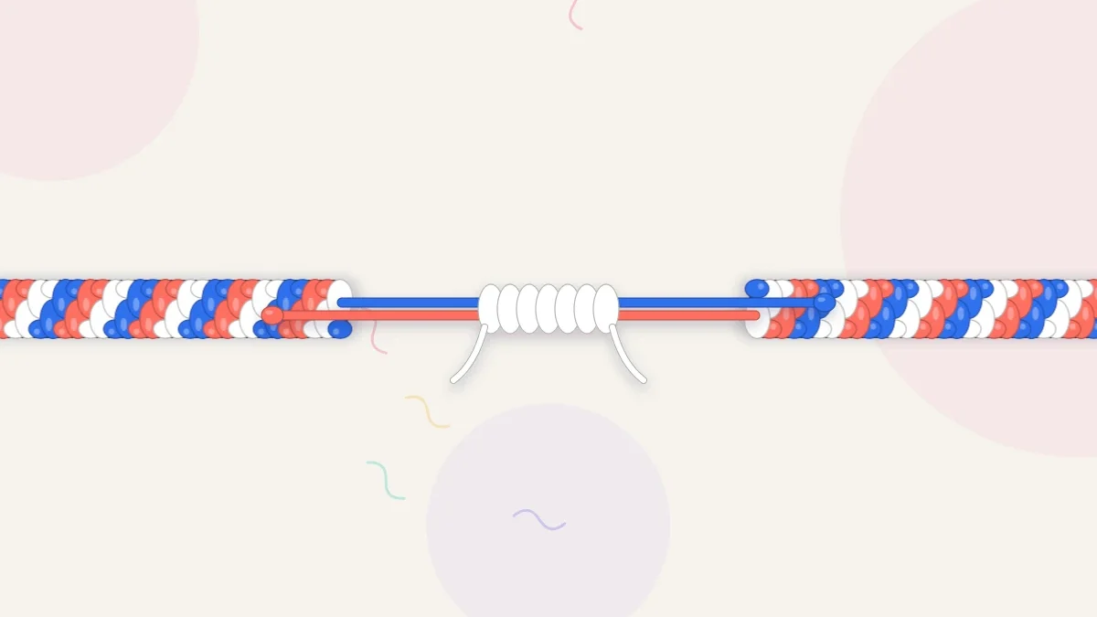 Two bracelet tails in cobalt, coral and white passing through a sliding knot sleeve