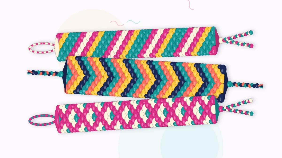 Three finished friendship bracelets stacked together: a candy stripe, a chevron and a diamond pattern