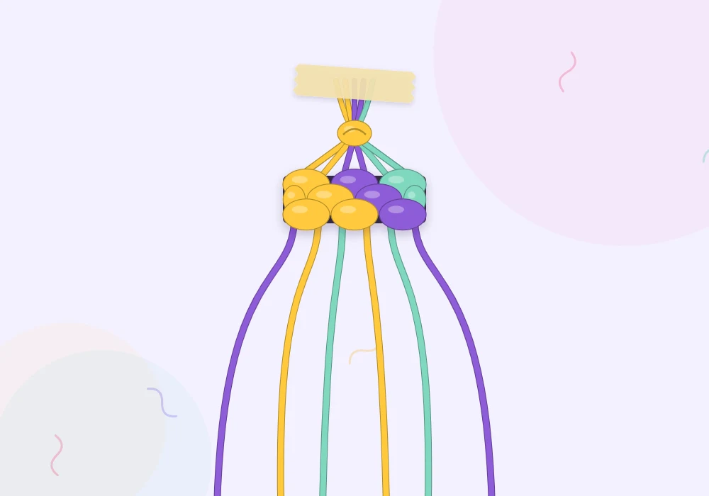 Sun yellow, violet and mint strings tied together in an overhand knot at the top, ready to be divided into bundles