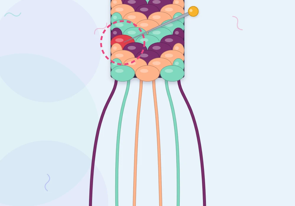 A chevron bracelet in plum, peach and mint with one knot of the wrong color circled and a pin beside it