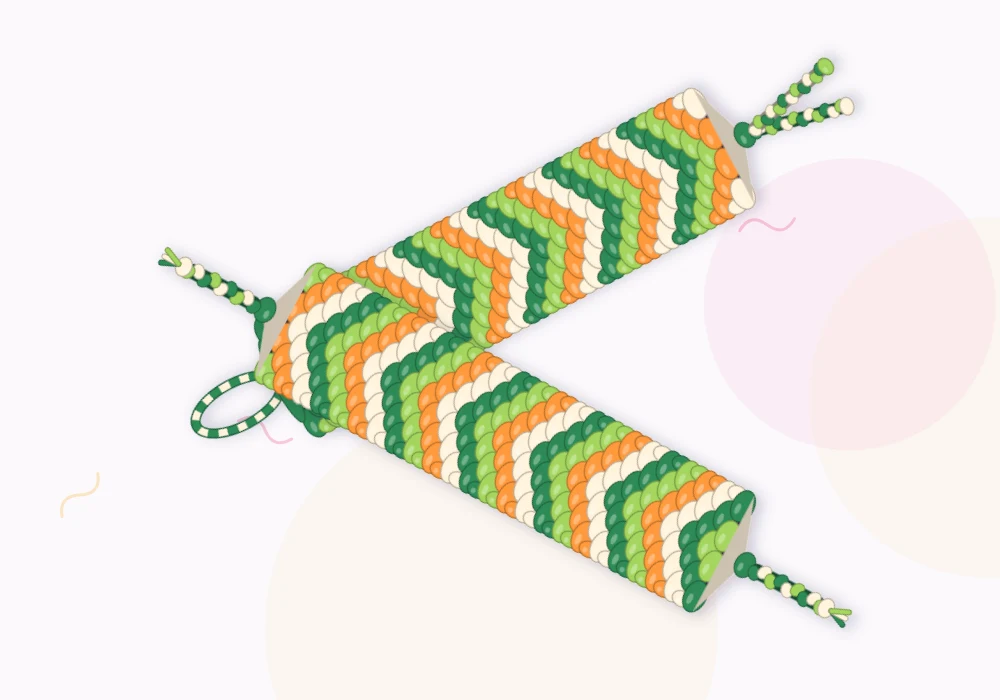 Two finished bracelets side by side in green, lime, cream and orange, one with a chevron pattern and one with a reverse chevron pattern
